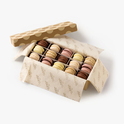 Gift Box tied with ribbon. Assortment of Swiss-style macarons made with natural ingredients.